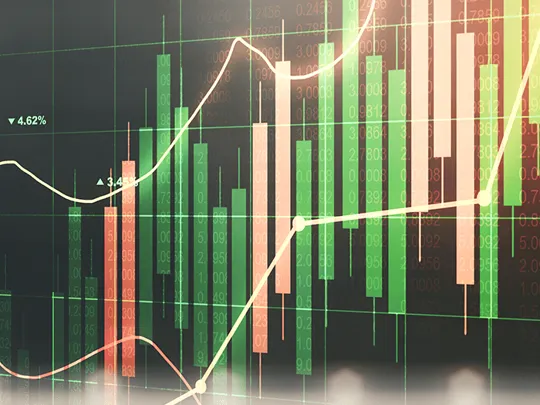 A dark background with a financial graph displaying stock market data. Green and red bar charts represent a fluctuating market, with white and red lines showing a trend line. The image is an abstract representation of economics and data.