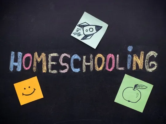 Homeschooling written out on a blackboard.