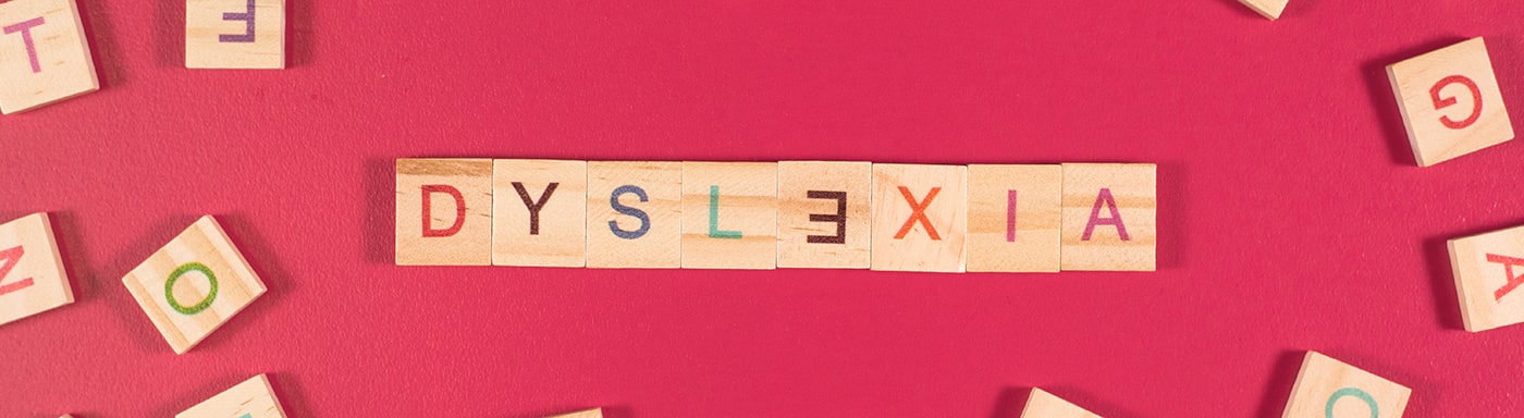 Dyslexia spelled out using wooden letters.