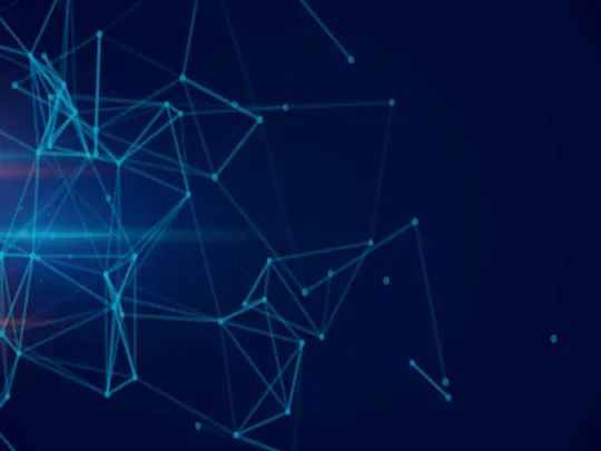 An abstract digital image with a dark blue background. Blue connected dots and lines form a complex network, with glowing orange and blue light streaks across the left side. The image represents digital society and interconnectedness.