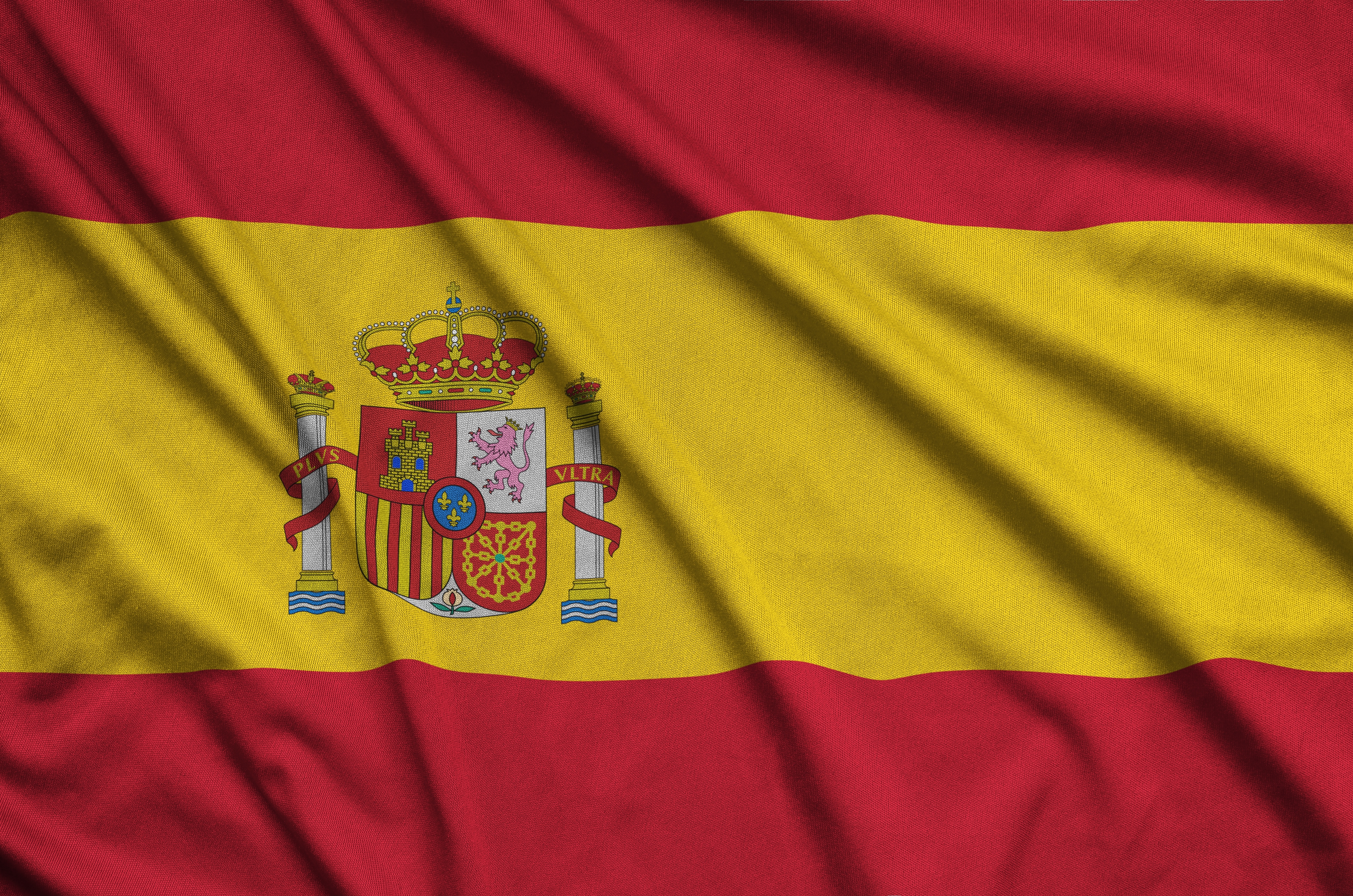 An image of the Spanish flag flowing in the wind. 
