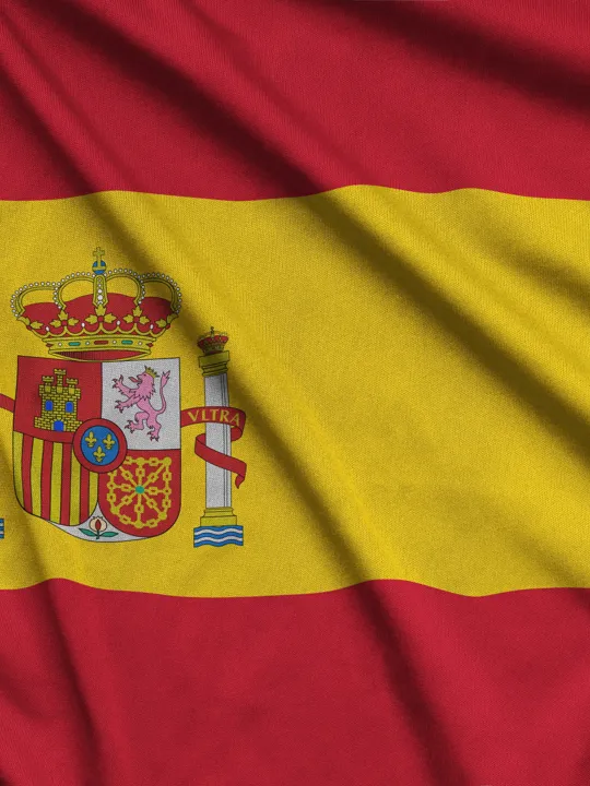 An image of the Spanish flag flowing in the wind.