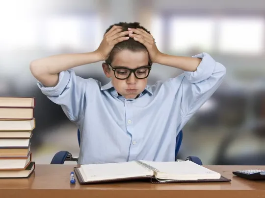 Young male child, deeply exhaling.
